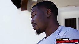 Lusty blonde cheerleader with pigtails is about to get stuffed with a big, black cock, from behind