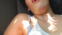 Teen brunette is sucking her new boyfriend's dick and getting fucked in the ass, in his car