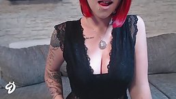 Red haired beauty, Nina is wearing black, lacy outfit and stockings, while posing for the camera