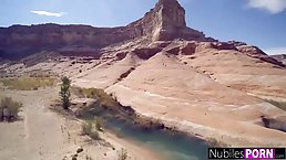Small titted girls were making love on the beach and then had sex with a horny stranger