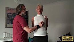 Blonde mature with small tits is wearing stockings and garter belt while getting fucked from behind