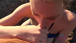 Pretty blonde girl likes to go to the beach and suck cock in the car
