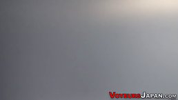 Horny Japanese schoolgirl is rubbing her soaking wet pussy in the toilet and moaning while cumming