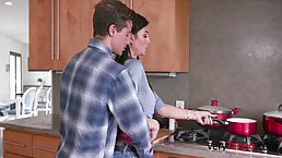 Brunette milf, Melissa Lynn is about to get hammered in the kitchen, while her husband is around