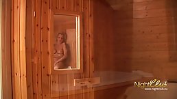 German blonde with big, firm tits is bouncing up and down while fucking a much younger guy