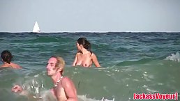Slim chick with small tits is naked on the beach and in the mood to be naughty