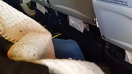Dirty minded redhead, Bella is sucking a stranger's dick while on the plane, just for fun