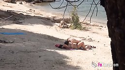 Horny, amateur couple is fucking on the beach in the middle of a beautiful day