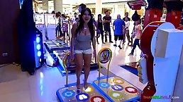 Thai babe with big, natural boobs is willing to get naked in front of the camera