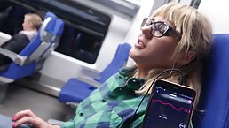 Blonde babe with glasses is rubbing and sucking a stranger's dick in the train, just for fun
