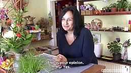 Experienced mature is riding a rock hard dick in a flower store, to get some cash