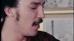 Vintage porn scenes with two passionate women taking turns sucking and riding a rock hard cock
