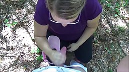 Big butt blonde is sucking a horny stranger's dick in the forest and getting fucked