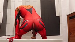 Asuka is a red haired babe in a red costume, who can't hold back from masturbation