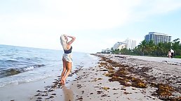 Blonde milf is posing naked on the beach, because it excites her more than anything else