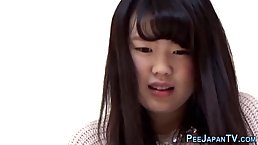 Asian babes are posing and peeing in front of the camera, because it feels so fucking good