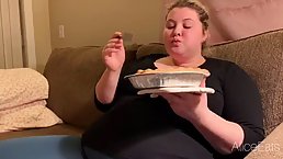 Fat chick is eating a pie and rubbing her massive belly, because it feels so fucking good
