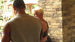 Mature, blonde woman with big, firm tits, Seka had interracial sex with a handsome, black dude