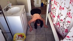 Brunette with big boobs is about to play with herself in a bit painful way