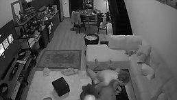 Two horny girls are getting fucked in a private apartment, in front of a hidden camera