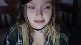 Flirty girl with big tits is posing on live cam and playing with her milk jugs