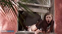 Adorable teen, Caroline Sweets is moaning while a black guy is fucking her from the back
