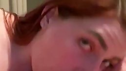 Red haired babe with braces is sucking a fat dick and getting it inside her wet pussy
