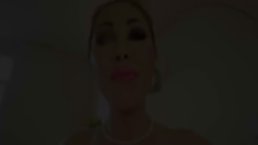 Busty Asian woman is sucking a big, hard cock in a POV style, to make it explode