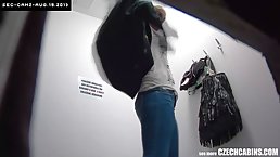 Great looking redhead was caught on tape while she was trying on clothes in a local store
