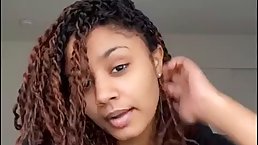 Adorable, Ebony girl is thinking about masturbating in front of the web camera, until she cums