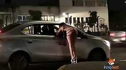 Gorgeous prostitute is wearing a super sexy, black dress that gets her all the clients she wants