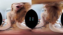 Red haired teen is having sex in VR and moaning while getting ready to cum