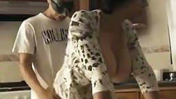 Masked guy is fucking a smoking hot housewife in her kitchen and listening to her moans