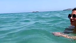 Naked brunette, Anna Polina is fucking a handsome, black guy on the beach and enjoying it