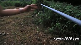 Korean brunette is sucking her new lovers dick in his car and enjoying it a lot