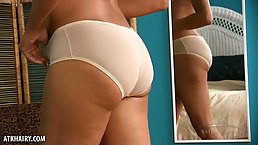 Mature Ebony woman, Ariel Grace took off her erotic lingerie and high heels to pose naked