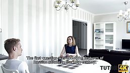 Blonde woman is wearing erotic stockings while bending over the kitchen table and getting fucked
