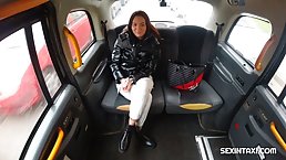 Seductive, amateur brunette is sucking a stranger's dick in the back of a car, just for fun