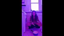 Insatiable teen brunette is masturbating in the kitchen thinking that no one is watching her