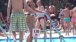 Ladies in bikinis are relaxing by the swimming pool while guys are staring at their asses