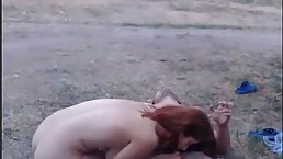 Frisky amateur girls are in the mood for a threesome in the nature, with their neighbor