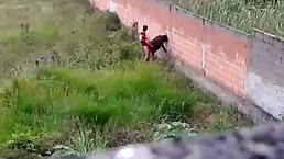 Horny couple was caught on tape while fucking in a public place, during the day