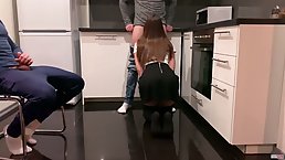 Experienced brunette is kneeling in front of her lover while waiting for her well deserved facial