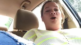 Fat blonde is alone in the car and using an opportunity to play with her pussy