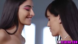 Cute teen brunette and her smoking hot step- mommy are eating each other up, on the couch