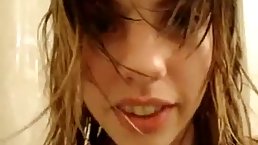 Valerie is a cute teen brunette who likes to make videos of herself while having a shower
