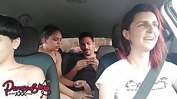 Horny couple is fucking in the back of a car while their friends are in front