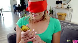 Blindfolded girl is riding her roommate's dick in the living room and enjoying it a lot