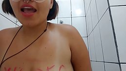 Chubby Latin babe with glasses is about to show us her tits and that big butt