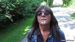 Mature brunette with small boobs is often sucking dick, showing her pussy or peeing in public places
